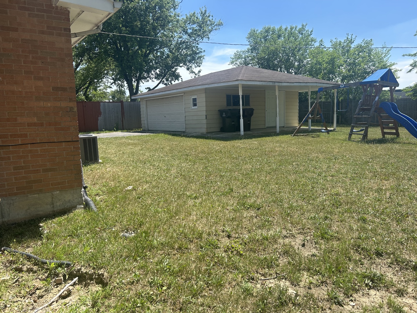 537 Nathan Road University Park, IL 60484 - Photo 26 of 27 a house with trees in front of it