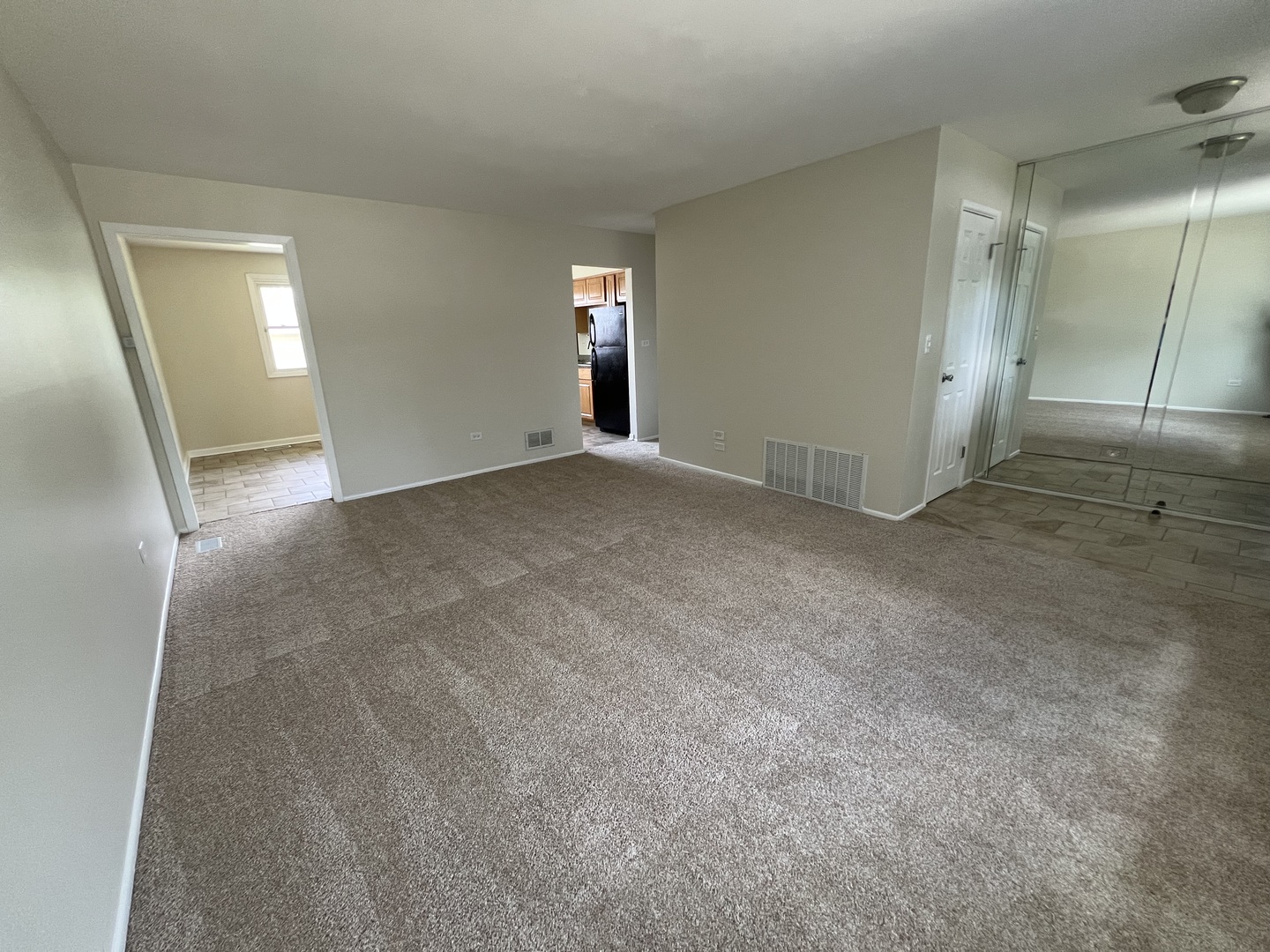 537 Nathan Road University Park, IL 60484 - Photo 3 of 27 an empty room with window and pillar in it
