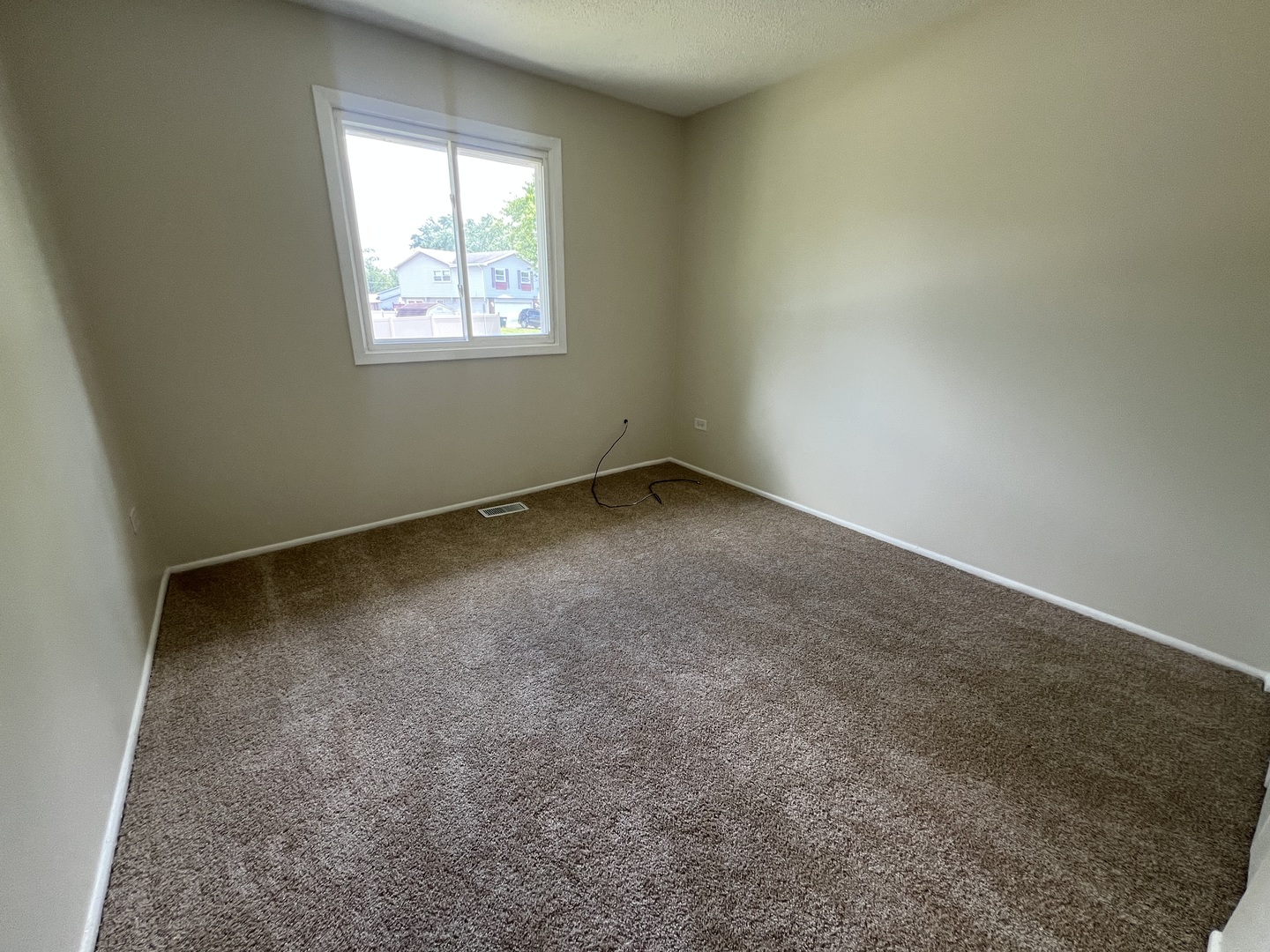 537 Nathan Road University Park, IL 60484 - Photo 9 of 27 an empty room with windows