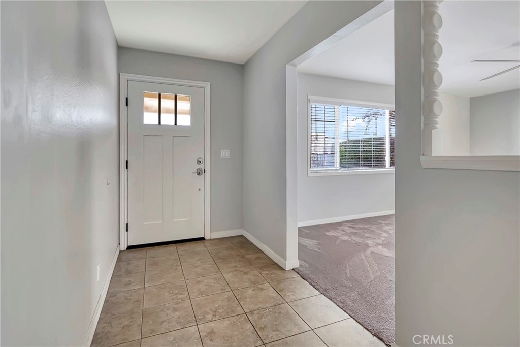 1115 South Groveland Place Anaheim, CA 92806 - Photo 17 of 42 an empty room with windows