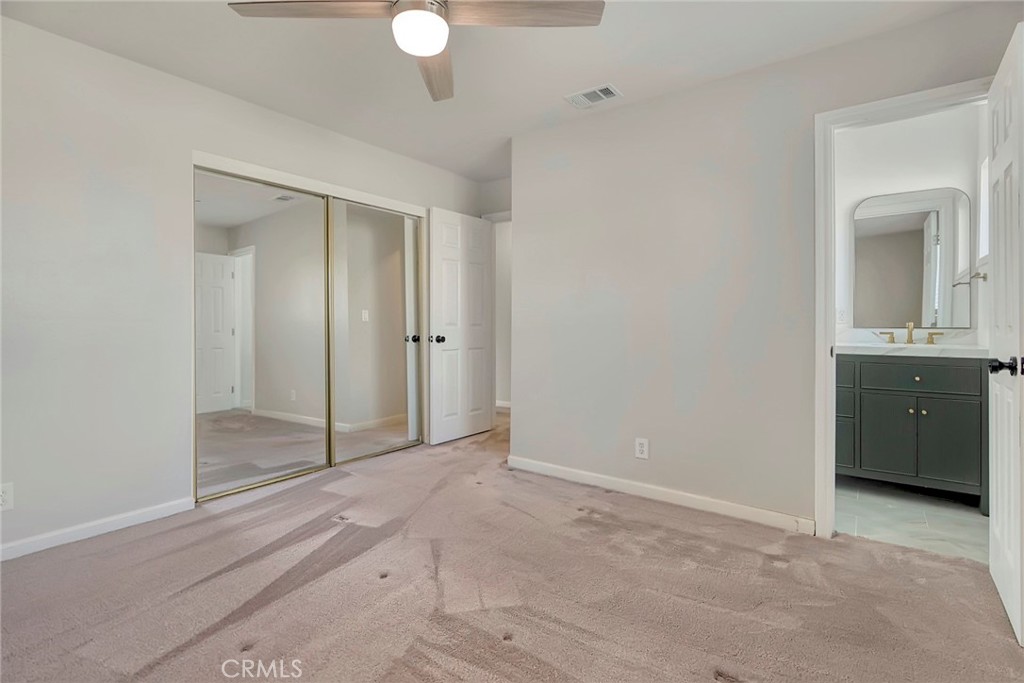 1115 South Groveland Place Anaheim, CA 92806 - Photo 27 of 42 a view of an empty room with closet and a bathroom