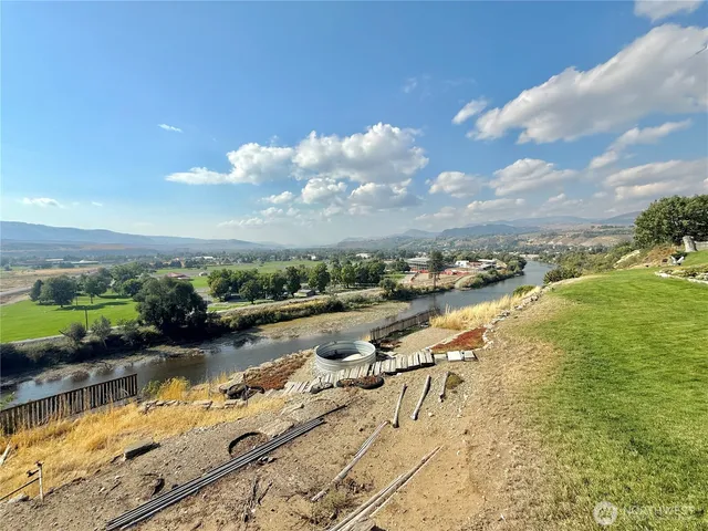 a view of a backyard with ocean