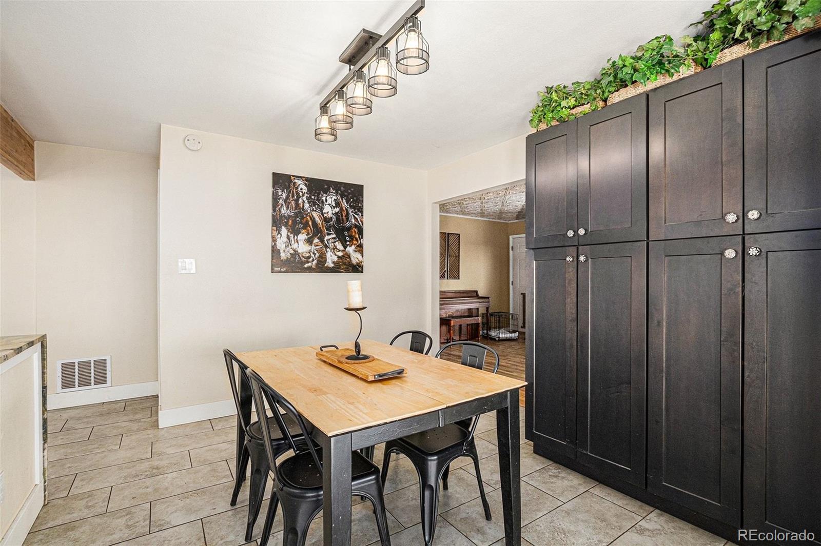 10148 South Turkey Creek Road Morrison, CO 80465 - Photo 10 of 50 a view of a dining room with furniture