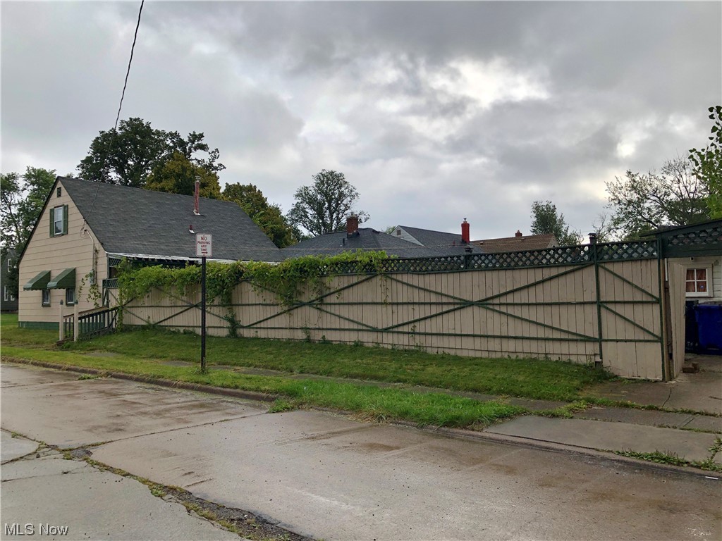 18421 Homeway Road Cleveland, OH 44135 - Photo 4 of 27 View of home's exterior with a yard