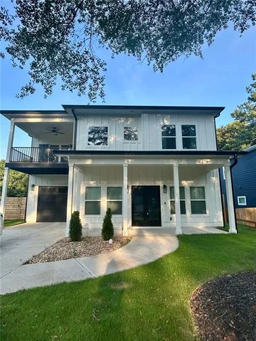 a view of a yard in front of a house