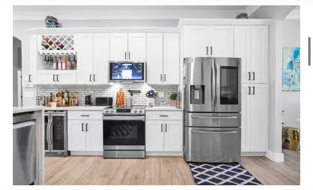a bedroom with furniture and a book shelf