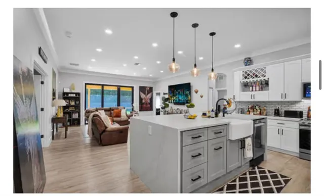 a bathroom with a toilet a sink and shower