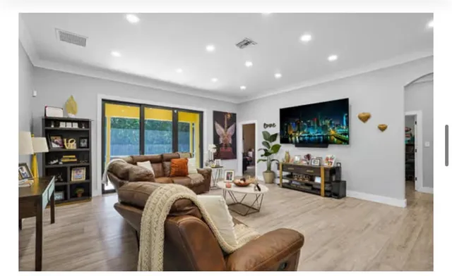 a bedroom with a bed and a desk