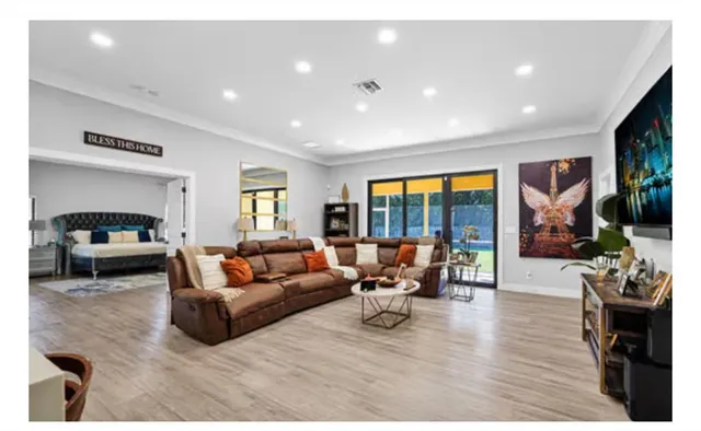 a view of a livingroom with furniture and storage