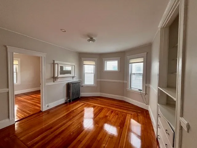 a bedroom with a bed and a view of bathroom