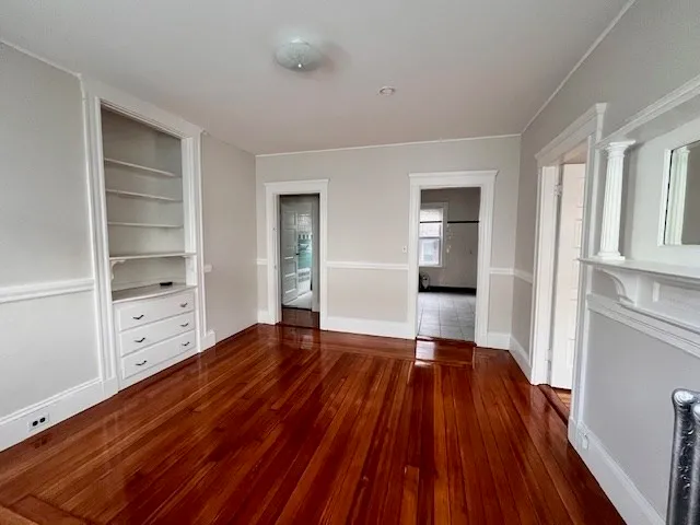 a view of an empty room and window