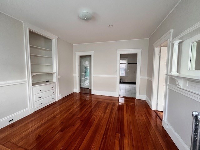 81 Pleasant Street, Unit 3 Boston, MA 02125 - Photo 2 of 21 a view of an empty room and window