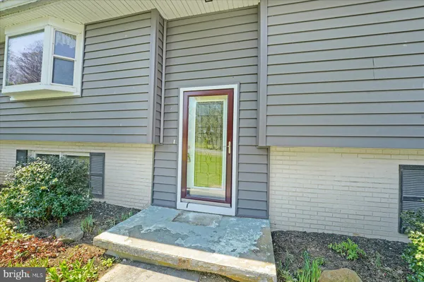 a view of a backyard with a door