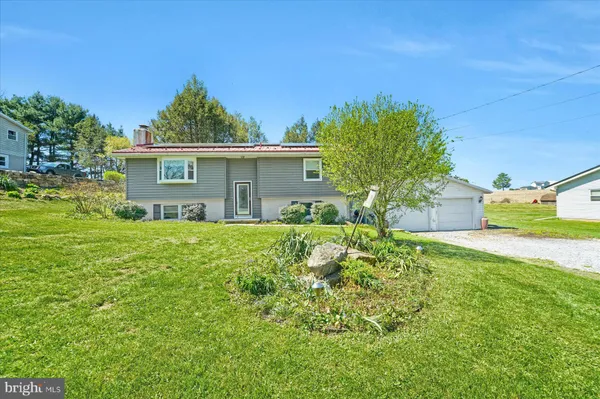 front view of house with a yard