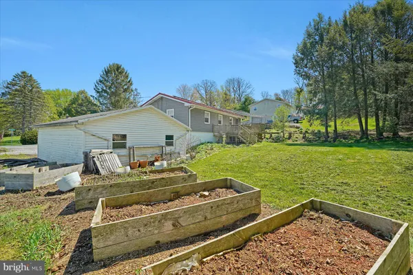 a view of a house with a big yard