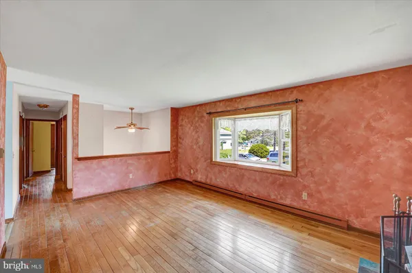 a view of an empty room and window