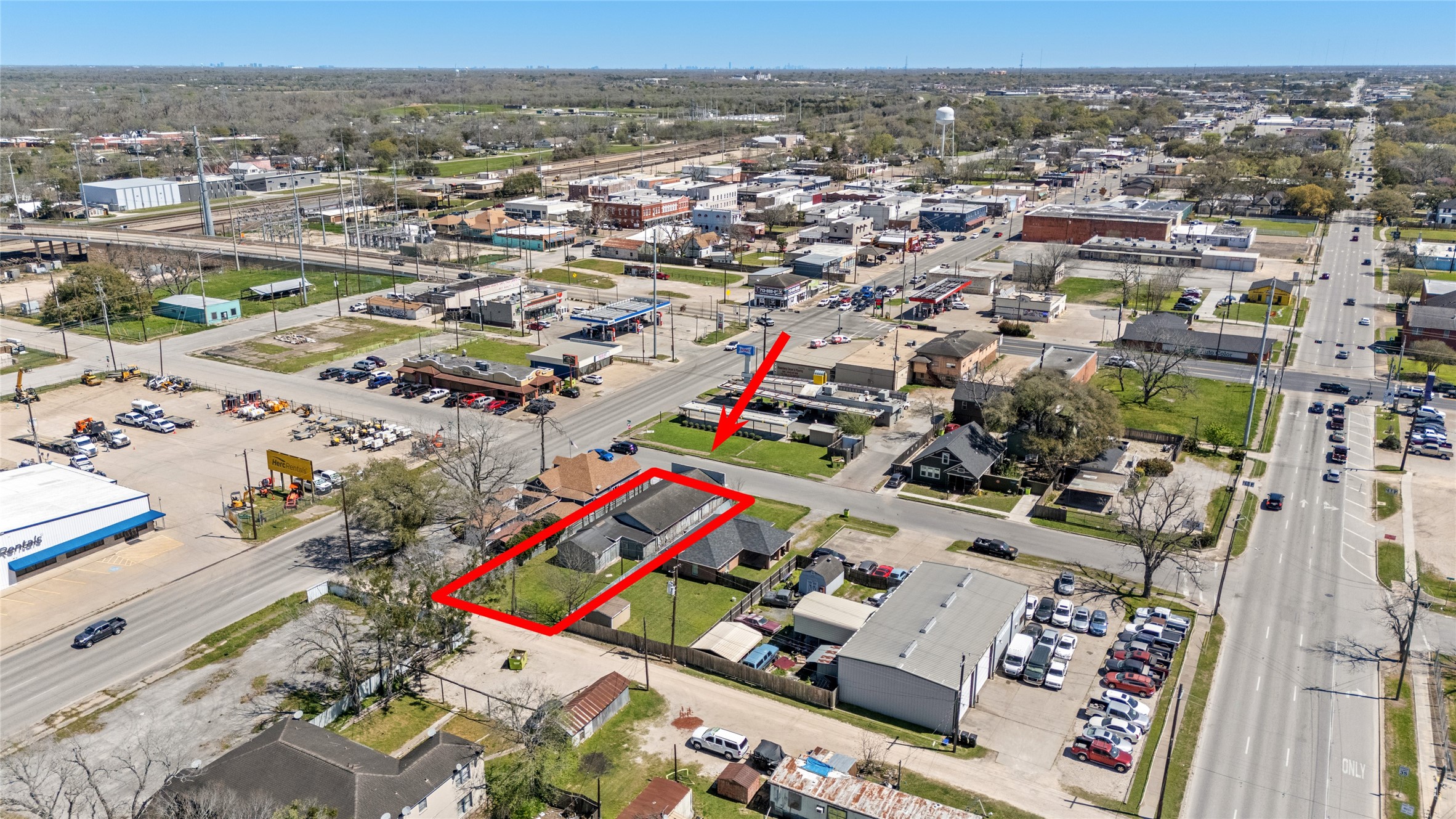 1004 Houston Street Rosenberg, TX 77471 - Photo 4 of 18 Sold for lot value only, the property is perfectly situated near major thoroughfares, retail businesses, and local amenities, providing unbeatable visibility and access.