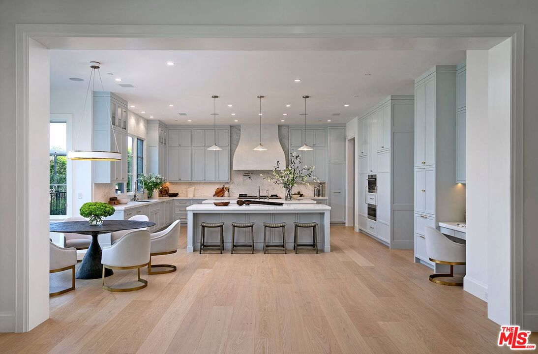 714 Alta Drive Beverly Hills, CA 90210 - Photo 14 of 29 a view of a kitchen and dining room