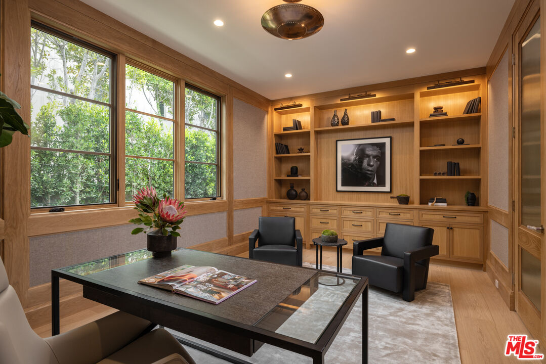 714 Alta Drive Beverly Hills, CA 90210 - Photo 18 of 29 a living room with furniture and a window