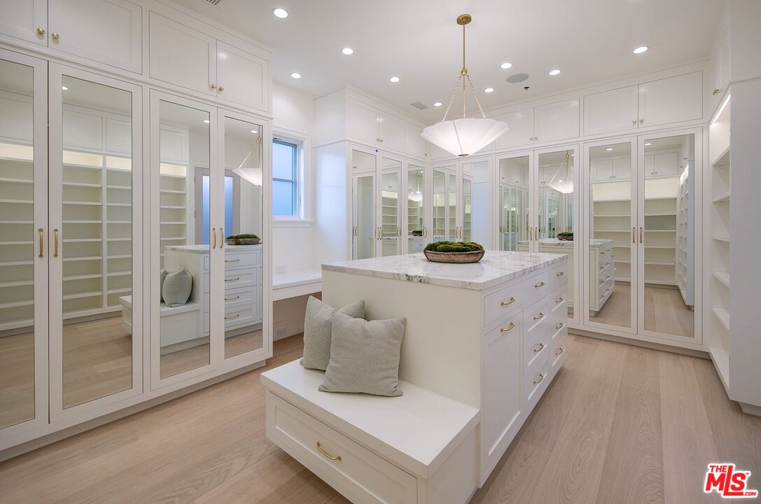 714 Alta Drive Beverly Hills, CA 90210 - Photo 23 of 29 a bathroom with a double vanity sink mirror and shower