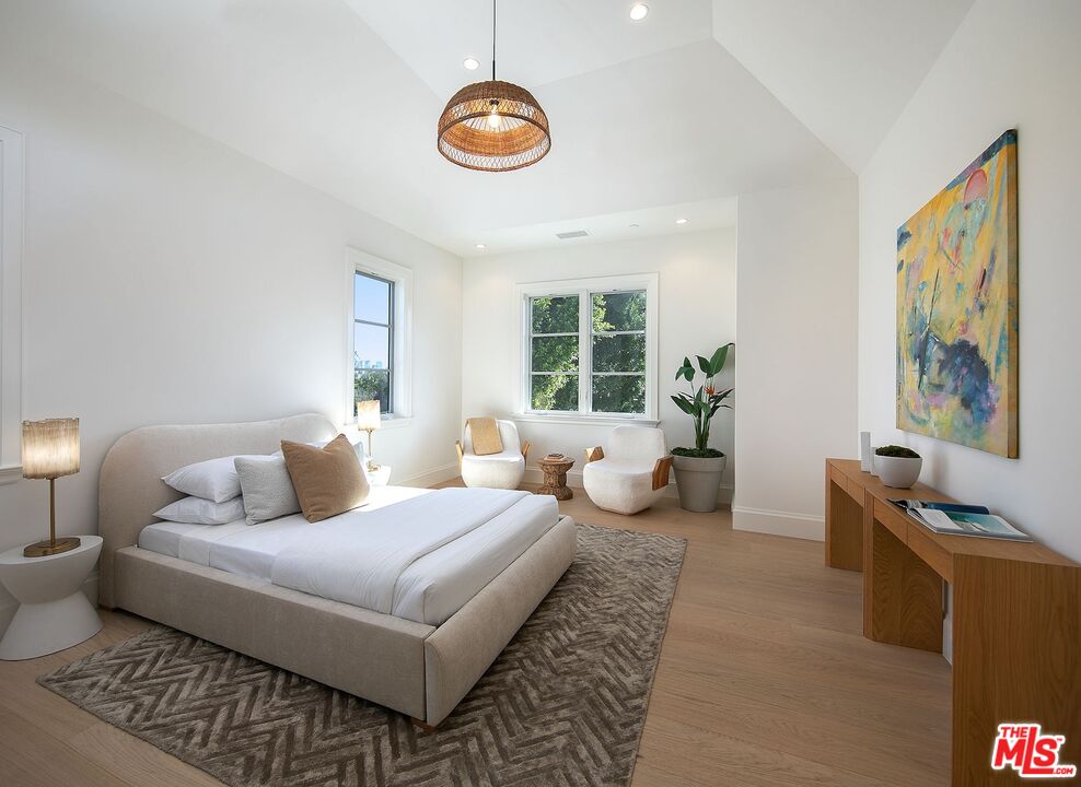 714 Alta Drive Beverly Hills, CA 90210 - Photo 27 of 29 a living room with furniture and a window