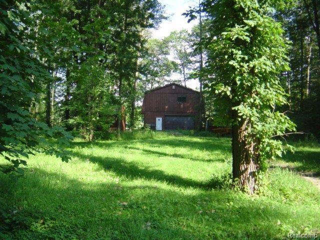 4676 County Line Road New Haven, MI 48048 - Photo 3 of 8 Back view of house & property