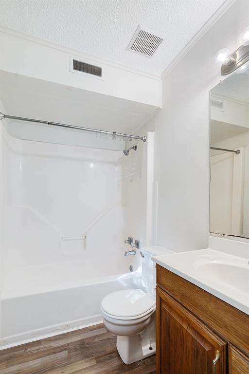 3875 Highway 271 Powderly, TX 75473 - Photo 12 of 25 a bathroom with a sink a toilet and shower