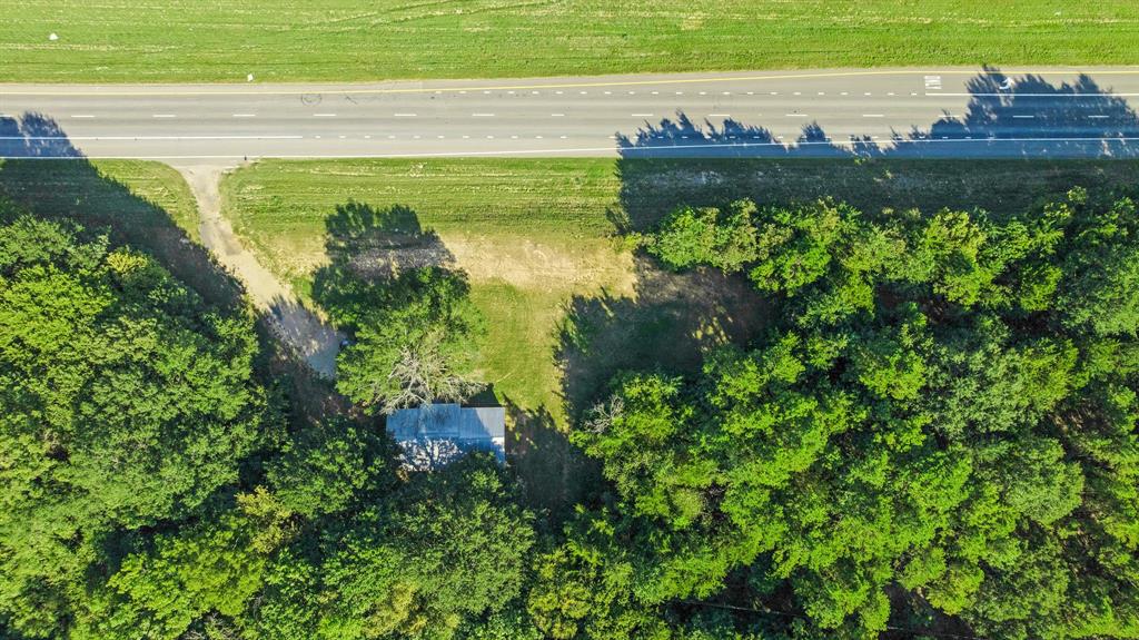 3875 Highway 271 Powderly, TX 75473 - Photo 23 of 25 a view of a garden with an ocean view