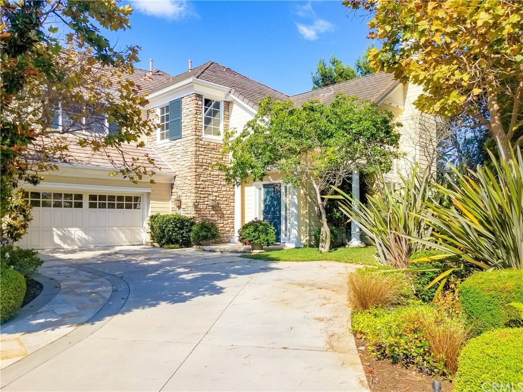 10 Thunderbird Drive Newport Beach, CA 92660 - Photo 1 of 5 a front view of a house with a yard