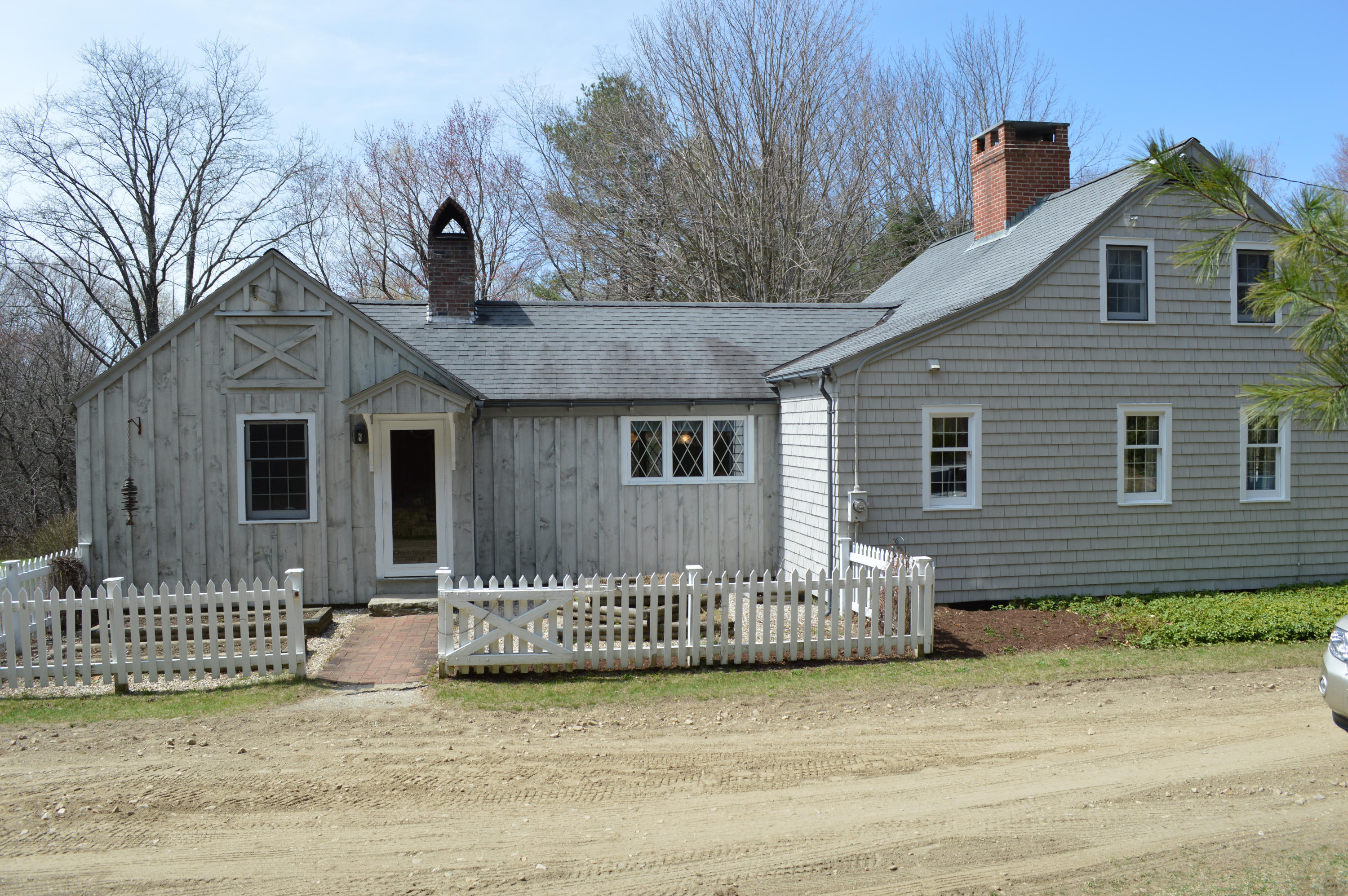 256 Middlefield Road Washington, MA 01223 - Photo 10 of 45 a front view of a house with a fence