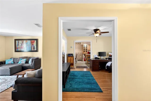 a living room with furniture and a rug