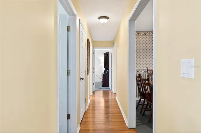 a view of a hallway with a white walls