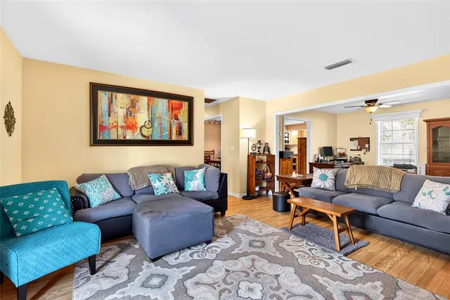 a living room with furniture and a rug