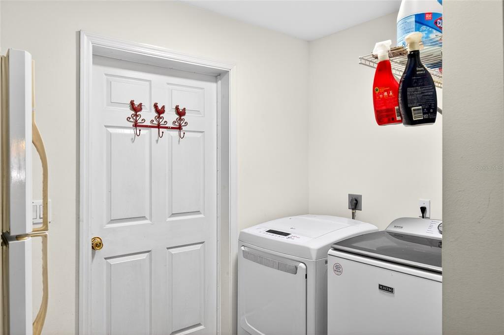 5940 Northeast 57th Loop Silver Springs, FL 34488 - Photo 36 of 44 a utility room with dryer and washer