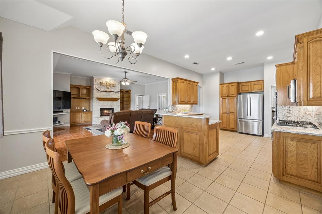 174 King Ranch Court Fort Worth, TX 76108 - Photo 10 of 40 Primary Home - Breakfast Area open to Kitchen and Family Room.