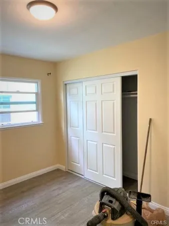 a view of livingroom with hardwood floor and window