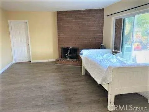 a spacious bathroom with a granite countertop sink and a mirror