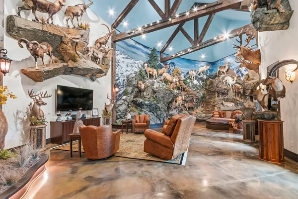 a kitchen with stainless steel appliances lots of counter space and wooden floor