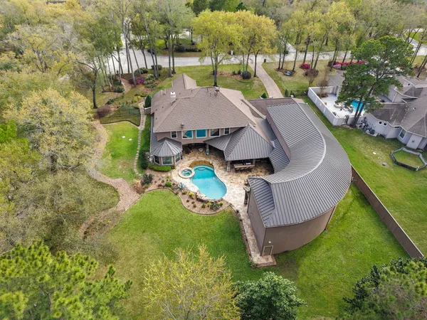 a view of yard with swimming pool and outdoor seating