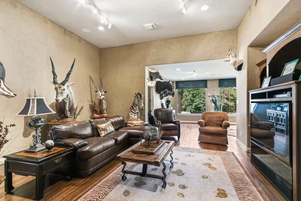 a bathroom with a sink a mirror and a shower