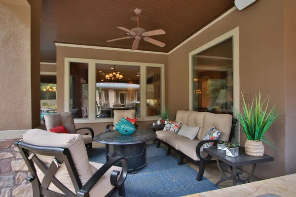 a bedroom with a bed and a table