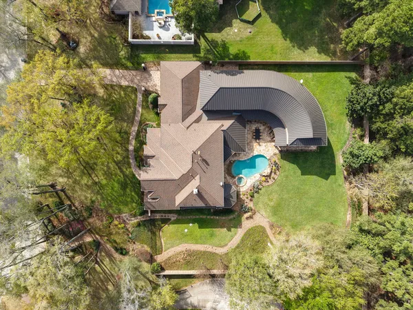 a backyard of a house with lots of green space