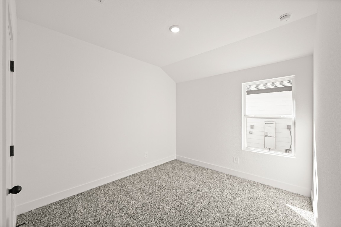 15775 Hanson Ridge Drive Montgomery, TX 77316 - Photo 22 of 33 an empty room with windows