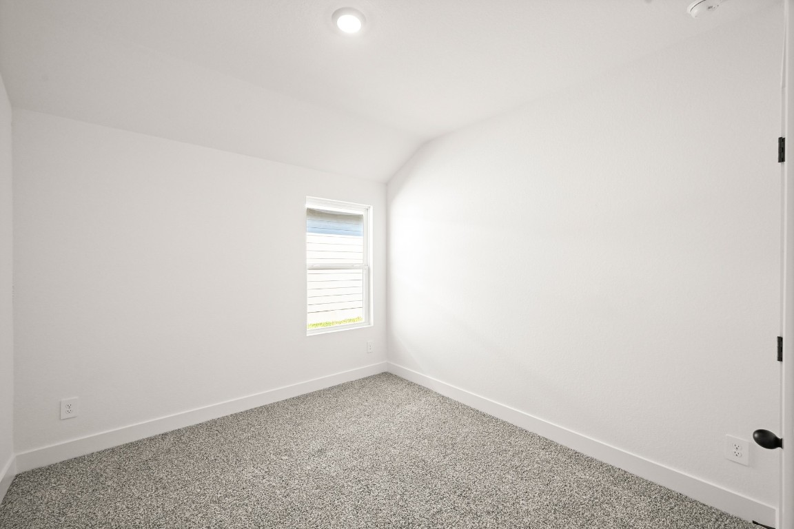 15775 Hanson Ridge Drive Montgomery, TX 77316 - Photo 25 of 33 an empty room with a window