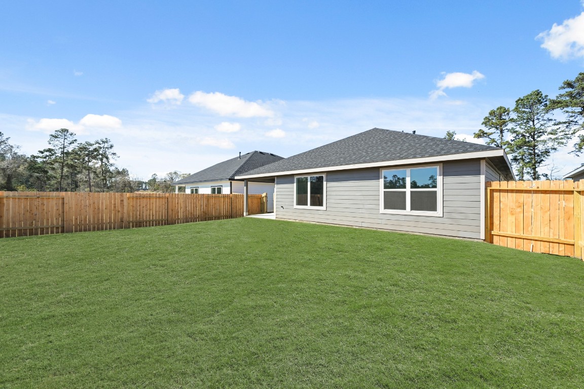 15775 Hanson Ridge Drive Montgomery, TX 77316 - Photo 30 of 33 a view of a backyard of the house