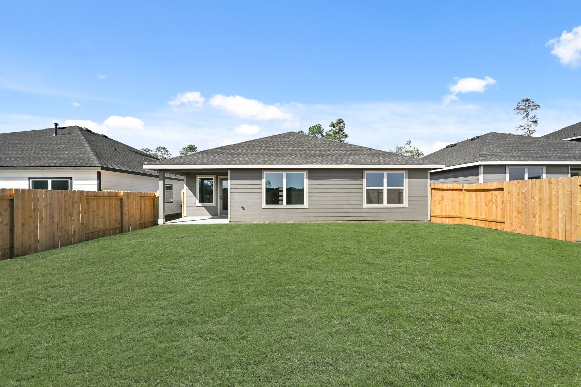 15775 Hanson Ridge Drive Montgomery, TX 77316 - Photo 31 of 33 a front view of a house with a yard
