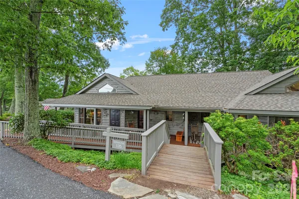 a house with trees in the background