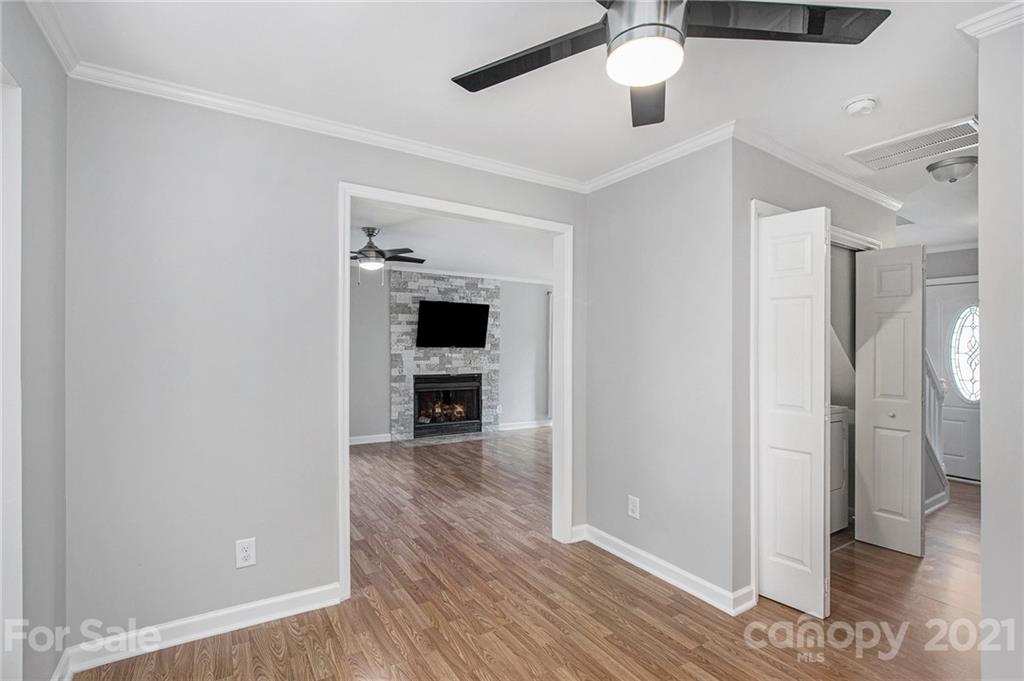 3517 Rosedown Drive Matthews, NC 28105 - Photo 14 of 28 a view of empty room with wooden floor and fan