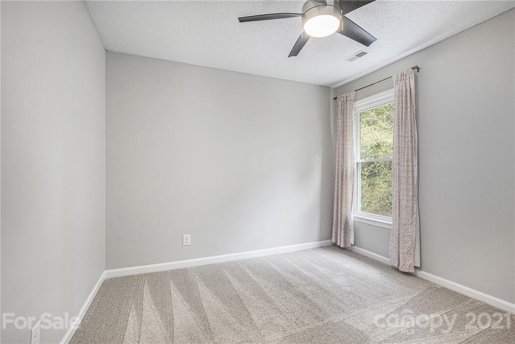 3517 Rosedown Drive Matthews, NC 28105 - Photo 25 of 28 wooden floor in an empty room with a window