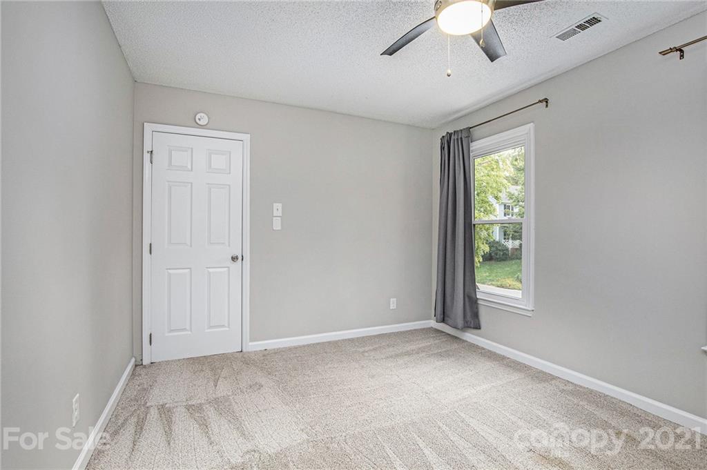 3517 Rosedown Drive Matthews, NC 28105 - Photo 28 of 28 a view of an empty room with a window